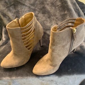 A new approach A. N. A. Tan Ankle boots